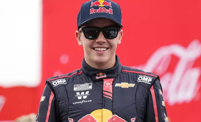 FILE - Connor Zilisch smiles prior to a NASCAR Cup Series auto race at Charlotte Motor Speedway, May 25, 2025, in Concord, N.C. (AP Photo/Matt Kelley, File)