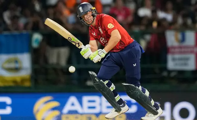 England's Jos Buttler plays a shot during the second T20 cricket match between England and Sri Lanka in Pallekele, Sri Lanka, Sunday, Feb, 1. 2026. (AP Photo/Eranga Jayawardena)