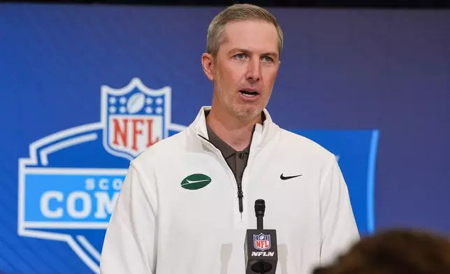 New York Jets general manager Darren Mougey speaks during a press conference at the NFL football scouting combine in Indianapolis, Tuesday, Feb. 24, 2026. (AP Photo/Michael Conroy)