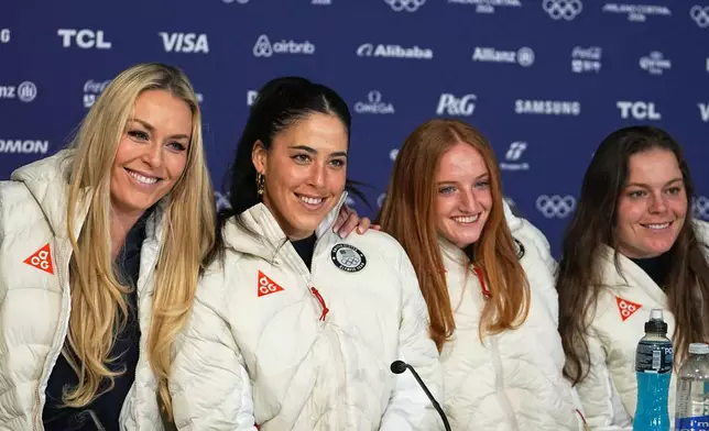 United States' Lindsey Vonn, Isabella Wright, Mary Bocock and Breezy Johnson, from left, attend a press conference by the U.S. ski team at the 2026 Winter Olympics, in Cortina d'Ampezzo, Italy, Tuesday, Feb. 3, 2026. (AP Photo/Fatima Shbair)