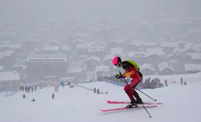 Spain's Oriol Cardona Coll competes during a ski mountaineering men's sprint heat, at the 2026 Winter Olympics, in Bormio, Italy, Thursday, Feb. 19, 2026. (AP Photo/John Locher)