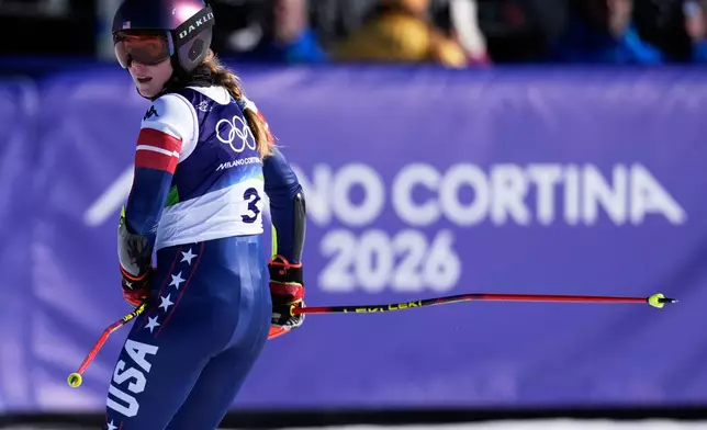 United States' Mikaela Shiffrin at the finish area during an alpine ski, women's giant slalom race, at the 2026 Winter Olympics, in Cortina d'Ampezzo, Italy, Sunday, Feb. 15, 2026. (AP Photo/Robert F. Bukaty)