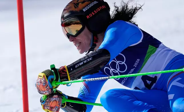 Italy's Federica Brignone speeds down the course, during an alpine ski, women's giant slalom race, at the 2026 Winter Olympics, in Cortina d'Ampezzo, Italy, Sunday, Feb. 15, 2026. (AP Photo/Robert F. Bukaty)