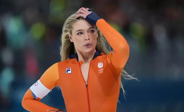 Jutta Leerdam of the Netherlands reacts after competing in the women's 500 meters speedskating race at the 2026 Winter Olympics, in Milan, Italy, Sunday, Feb. 15, 2026. (AP Photo/Antonio Calanni)