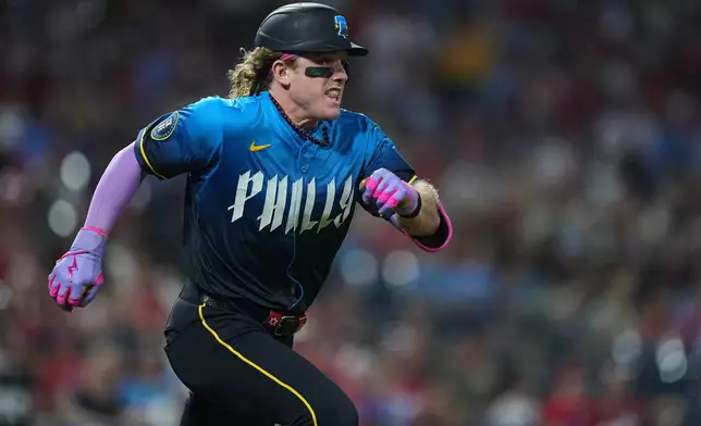 FILE - Philadelphia Phillies' Harrison Bader runs during a baseball game Sept. 26, 2025, in Philadelphia. (AP Photo/Matt Rourke, File)