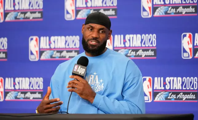 USA Stripes forward LeBron James (23) answers questions before the NBA All-Star basketball game Sunday, Feb. 15, 2026, in Inglewood, Calif. (AP Photo/Mark J. Terrill)