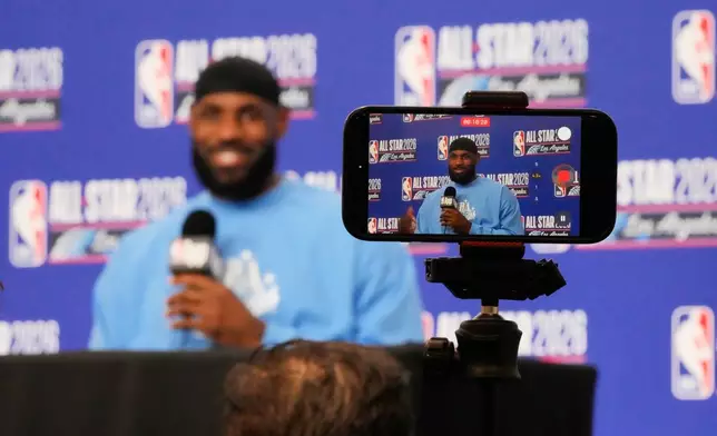 USA Stripes forward LeBron James (23) answers questions before the NBA All-Star basketball game Sunday, Feb. 15, 2026, in Inglewood, Calif. (AP Photo/Mark J. Terrill)