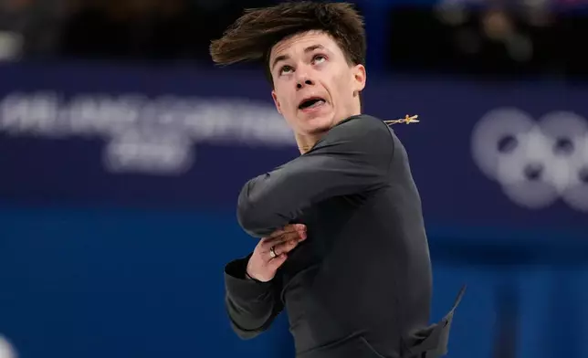 Maxim Naumov of the United States competes during the men's free skate program in figure skating at the 2026 Winter Olympics, in Milan, Italy, Friday, Feb. 13, 2026. (AP Photo/Ashley Landis)