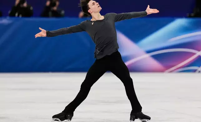 Maxim Naumov of the United States competes during the men's free skate program in figure skating at the 2026 Winter Olympics, in Milan, Italy, Friday, Feb. 13, 2026. (AP Photo/Ashley Landis)