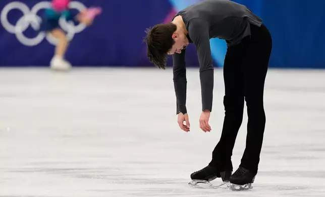 Maxim Naumov of the United States competes during the men's free skate program in figure skating at the 2026 Winter Olympics, in Milan, Italy, Friday, Feb. 13, 2026. (AP Photo/Ashley Landis)