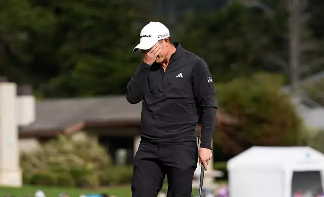 Collin Morikawa reacts after making a birdie putt on the 18th hole at Pebble Beach Golf Links during the final round of the AT&amp;T Pebble Beach Pro-Am golf tournament in Pebble Beach, Calif., Sunday, Feb. 15, 2026. (AP Photo/Godofredo A. Vásquez)