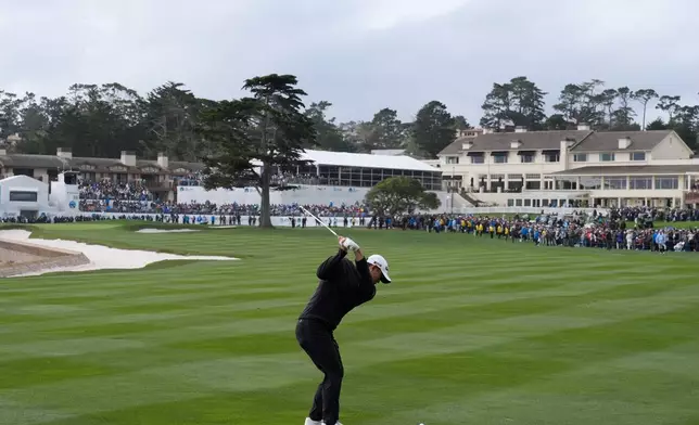 Collin Morikawa hits from the 18th fairway at Pebble Beach Golf Links during the final round of the AT&amp;T Pebble Beach Pro-Am golf tournament in Pebble Beach, Calif., Sunday, Feb. 15, 2026. (AP Photo/Godofredo A. Vásquez)