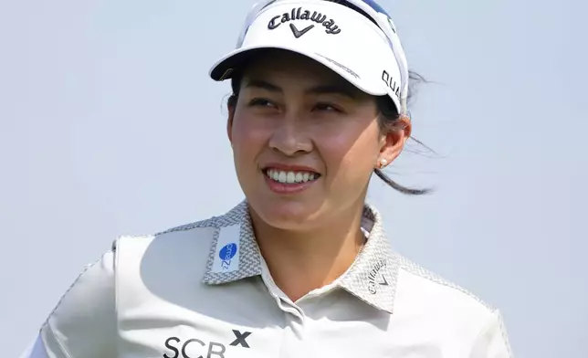 Jeeno Thitikul of Thailand reacts on the green during the HSBC World Championship of women's golf at Sentosa Golf Club in Singapore, Thursday, Feb. 26, 2026. (AP Photo/Suhaimi Abdullah)
