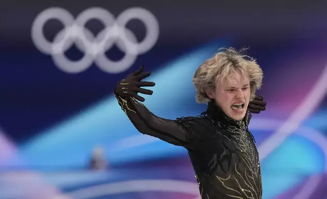 Ilia Malinin of the United States competes during the figure skating men's team event at the 2026 Winter Olympics, in Milan, Italy, Sunday, Feb. 8, 2026. (AP Photo/Stephanie Scarbrough)