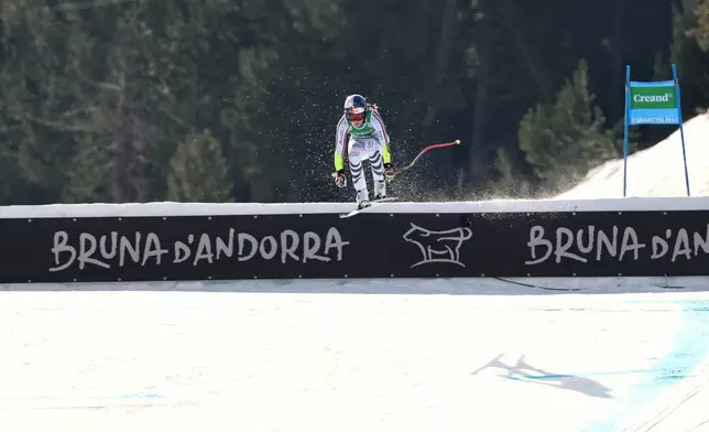 Germany's Emma Aicher speeds down the course during a women's World Cup super-G race, in Soldeu, Andorra, Saturday, Feb. 28, 2026. (AP Photo/Marco Trovati)