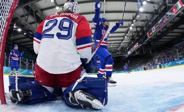 United States' Grace Zumwinkle, center, celebrates a goal during a preliminary round match of women's ice hockey between United States and Czechia at the 2026 Winter Olympics, in Milan, Italy, Thursday, Feb. 5, 2026. (Sun Fei/Pool Photo via AP)