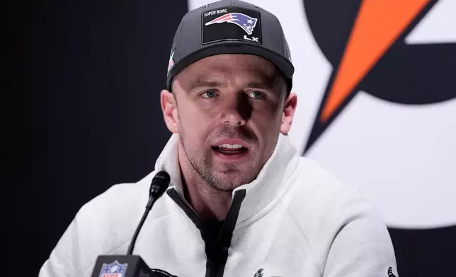 New England Patriots linebacker Robert Spillane speaks during the NFL Super Bowl Opening Night, Monday, Feb. 2, 2026, in San Jose, Calif. ahead of the Super Bowl 60 football game between the New England Patriots and the Seattle Seahawks. (AP Photo/Godofredo A. Vásquez)