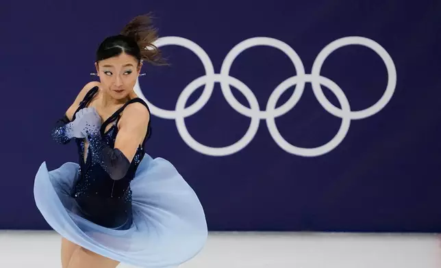 Kaori Sakamoto of Japan competes during the women's short program figure skating at the 2026 Winter Olympics, in Milan, Italy, Tuesday, Feb. 17, 2026. (AP Photo/Ashley Landis)