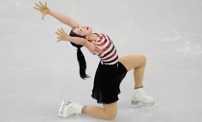 Ami Nakai of Japan competes during the women's short program figure skating at the 2026 Winter Olympics, in Milan, Italy, Tuesday, Feb. 17, 2026. (AP Photo/Ashley Landis)