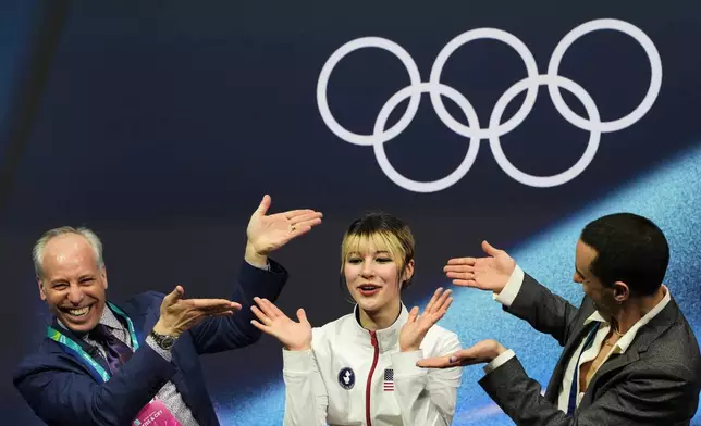 Alysa Liu of the United States reacts to her score after competing in the women's short program in figure skating at the 2026 Winter Olympics, in Milan, Italy, Tuesday, Feb. 17, 2026. (AP Photo/Natacha Pisarenko)