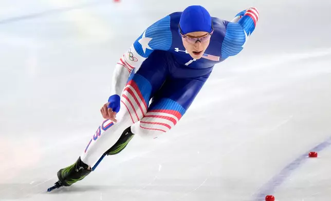 Jordan Stolz of the U.S. competes in the men's 500 meters speedskating race at the 2026 Winter Olympics, in Milan, Italy, Saturday, Feb. 14, 2026. (AP Photo/Luca Bruno)