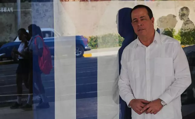 Cuba's Minister of Health, José Ángel Portal Miranda, poses at the ministry's entrance in Havana, Friday, Feb. 20, 2026. (AP Photo/Ramon Espinosa)