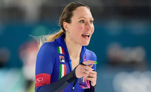 Francesca Lollobrigida of Italy reacts after competing in the women's 3,000 meters speedskating race at the 2026 Winter Olympics, in Milan, Italy, Saturday, Feb. 7, 2026. (AP Photo/Luca Bruno)