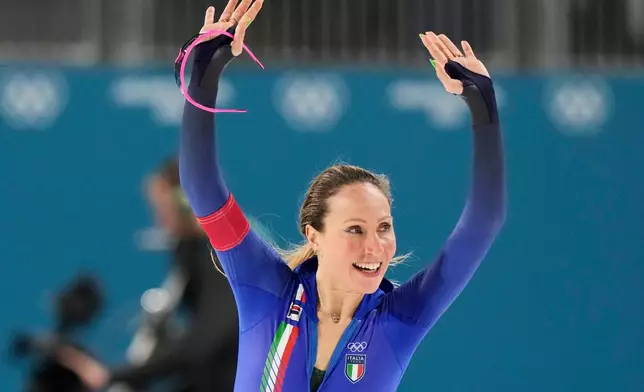 Francesca Lollobrigida of Italy celebrates after competing in the women's 3,000 meters speedskating race at the 2026 Winter Olympics, in Milan, Italy, Saturday, Feb. 7, 2026. (AP Photo/Luca Bruno)