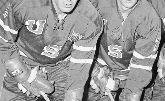 FILE - U .S. Olympic ice hockey forwards Roger Christian, left, and Bill Christian pose Jan. 6, 1960, at the United States Military Academy in West Point, N.Y. (AP Photo/John Rooney, File)