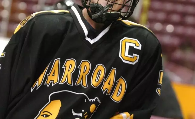 FILE - Gigi Marvin, a senior center at Warroad High School, poses for a photo Dec. 27, 2004, at Mariucci Arena in Minneapolis, where she plans to play hockey next year with the University of Minnesota. (Chris Polydoroff/Pioneer Press via AP, File)