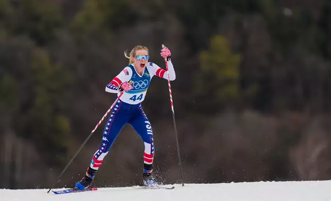 Jessie Diggins, of the United States, competes in the cross country skiing women's 10km interval start free at the 2026 Winter Olympics, in Tesero, Italy, Thursday, Feb. 12, 2026. (AP Photo/Matthias Schrader)