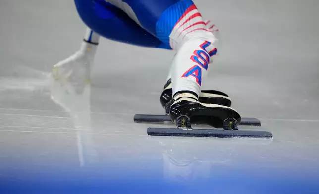 Kristen Santos-Griswold of the United States competes during the short track speed skating women's 500m at the 2026 Winter Olympics, in Milan, Italy, Thursday, Feb. 12, 2026. (AP Photo/Natacha Pisarenko)