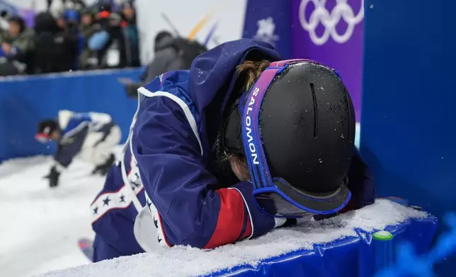 United States' Maddie Mastro reacts after her run during the women's snowboarding halfpipe finals at the 2026 Winter Olympics, in Livigno, Italy, Thursday, Feb. 12, 2026. (AP Photo/Lindsey Wasson)