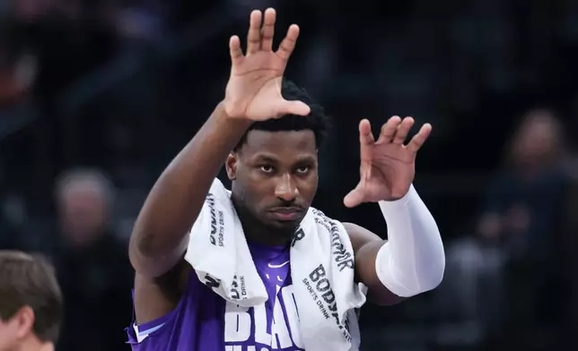 Utah Jazz forward Jaren Jackson Jr. reacts after a play against the Sacramento Kings during the first half of an NBA basketball game, Wednesday, Feb. 11, 2026, in Salt Lake City. (AP Photo/Rob Gray)