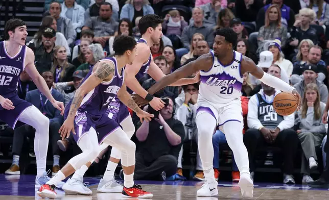 Utah Jazz forward Jaren Jackson Jr. (20) posts up against the Sacramento Kings during the first half of an NBA basketball game, Wednesday, Feb. 11, 2026, in Salt Lake City. (AP Photo/Rob Gray)