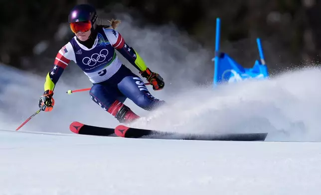 United States' Mikaela Shiffrin speeds down the course, during an alpine ski, women's giant slalom race, at the 2026 Winter Olympics, in Cortina d'Ampezzo, Italy, Sunday, Feb. 15, 2026. (AP Photo/Robert F. Bukaty)