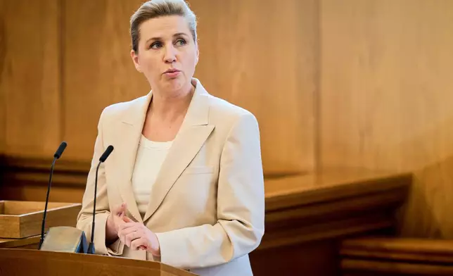 Danish Prime Minister Mette Frederiksen speaks in the Folketing hall, the Danish parliament, in Copenhagen, Thursday, Feb. 26, 2026. (Thomas Traasdahl/Ritzau Scanpix via AP)