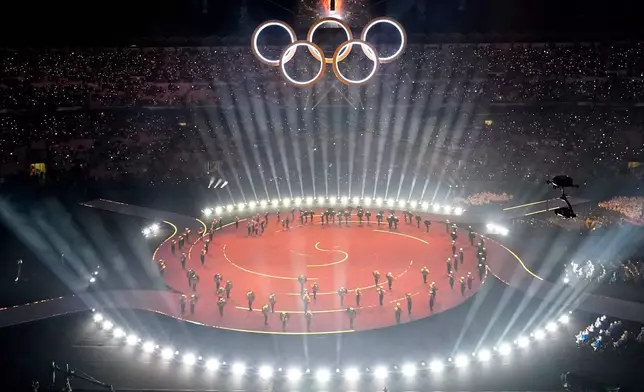 A view of the Olympic opening ceremony at the 2026 Winter Olympics, in Milan, Italy, Friday, Feb. 6, 2026. (AP Photo/Francisco Seco)