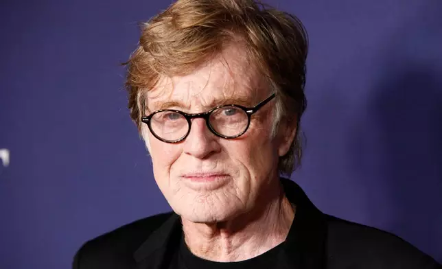 FILE - Robert Redford attends a premiere on Sept. 27, 2017, in New York. (Photo by Andy Kropa/Invision/AP, File)