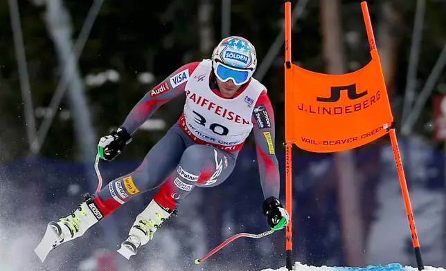 FILE - United States' Bode Miller races down the course during a training run for the men's downhill competition at the alpine skiing world championships on Feb. 3, 2015, in Beaver Creek, Colo. (AP Photo/John Locher, File)