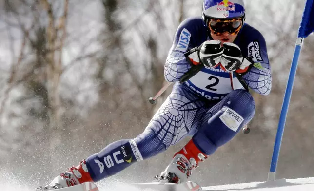 FILE - Daron Rahlves, of Sugar Bowl, Calif., skiis down for a firs-place finish during the men's super-G at the US Alpine Ski Championships, March 26, 2006, in Carrabassett Valley, Maine. (AP Photo/Jim Cole, File)