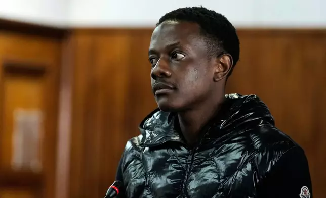Bellarmine Chatunga Mugabe, son of former Zimbabwe President Robert Mugabe, appears at the Alexandra Magistrates Court in Johannesburg, South Africa, Monday, Feb. 23, 2026, on charges stemming from last week's shooting incident at his home in Hyde Park. (AP Photo/Themba Hadebe)