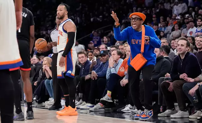 Spike Lee screams during the second half of an NBA basketball game between the New York Knicks and the Houston Rockets, Saturday, Feb. 21, 2026, in New York. (AP Photo/Yuki Iwamura)