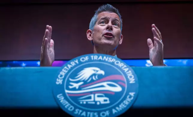 U.S. Department of Transportation Secretary Sean Duffy speaks during a news conference on enhancing truck driving safety at the U.S. Department of Transportation on Friday, Feb. 20, 2026, in Washington. (AP Photo/Tom Brenner)