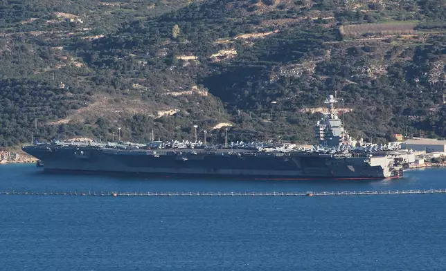 The US Navy's aircraft carrier USS Gerald R. Ford is docked at Souda naval base near the city of Chania, on the southern island of Crete, Greece, on Tuesday, Feb. 24, 2026. (AP Photo/Giannis Angelakis)