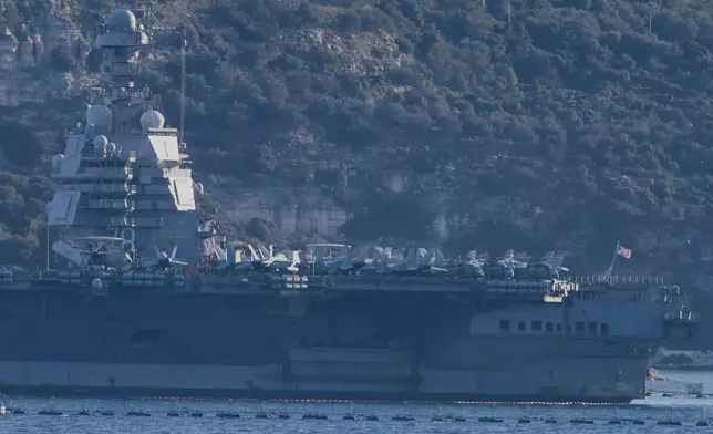 The US Navy's aircraft carrier USS Gerald R. Ford is docked at Souda naval base near the city of Chania, on the southern island of Crete, Greece, on Tuesday, Feb. 24, 2026. (AP Photo/Giannis Angelakis)