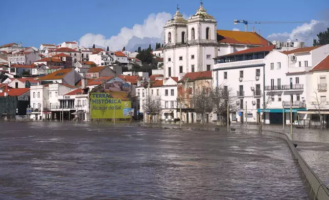 A view of Alcácer do Sal, southern Portugal, Friday, Feb. 6, 2026, after the Sado River overflowed following heavy rains. (AP Photo/Ana Brigida)