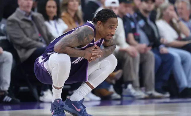 Sacramento Kings guard DeMar DeRozan waits for play to start before an NBA basketball game against the Utah Jazz, Wednesday, Feb. 11, 2026, in Salt Lake City. (AP Photo/Rob Gray)