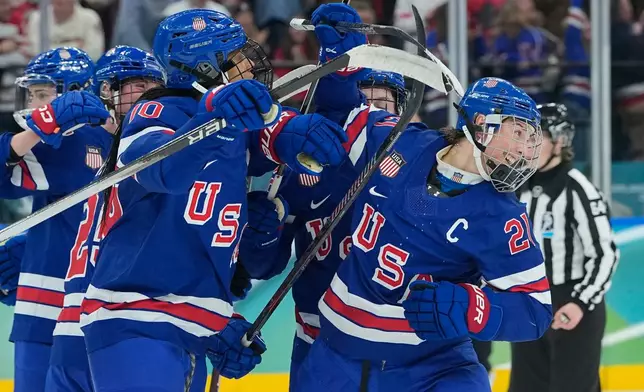 United States' Hilary Knight (21) celebrates after scoring an equalizer during a women's ice hockey gold medal game between the United States and Canada at the 2026 Winter Olympics, in Milan, Italy, Thursday, Feb. 19, 2026. (AP Photo/Petr David Josek)