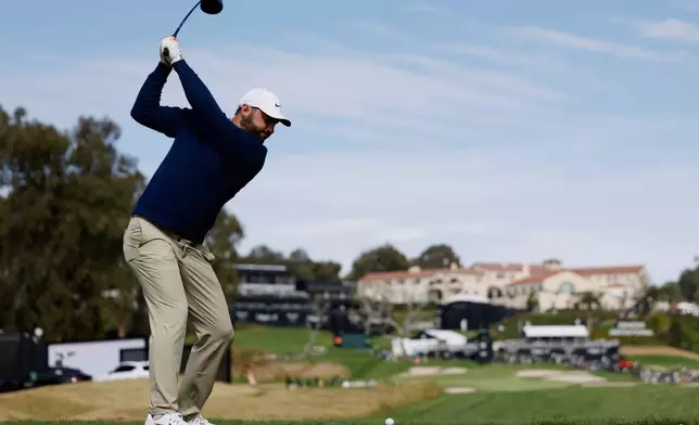 Scottie Scheffler hits from the ninth tee during the second round of the Genesis Invitational golf tournament at Riviera Country Club, Friday, Feb. 20, 2026, in the Pacific Palisades area of Los Angeles. (AP Photo/Caroline Brehman)